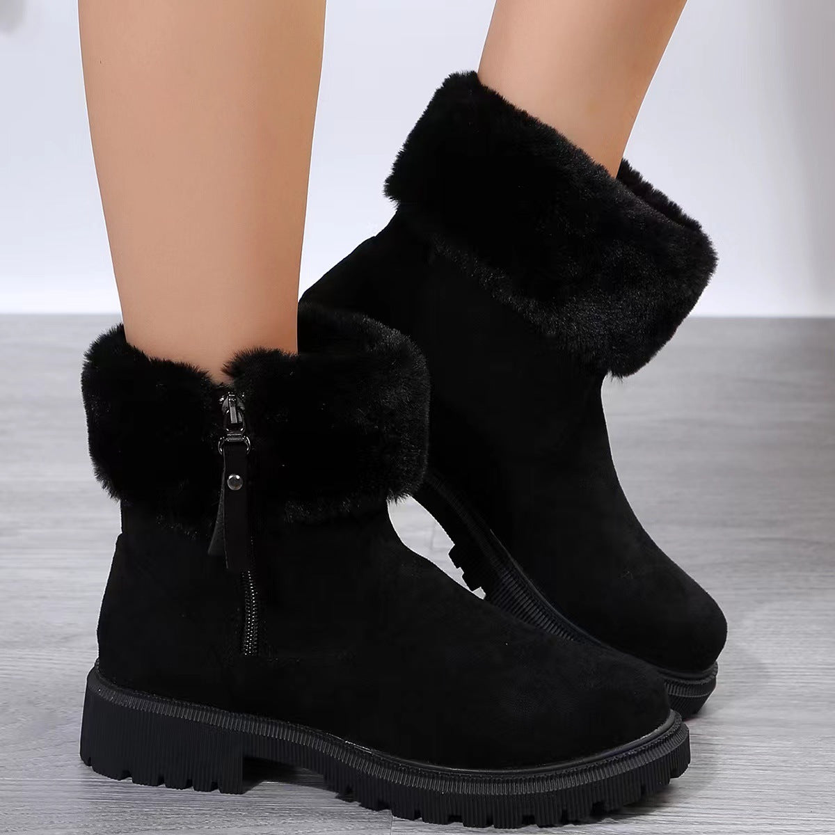 Rubber sole and thick heel detail on Aspen plush-lined winter boots