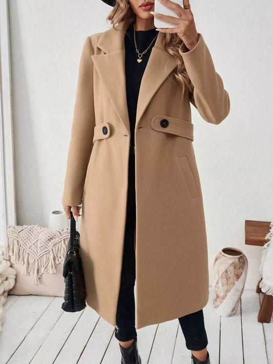Women’s long camel overcoat with belt, pockets, and one-button closure
