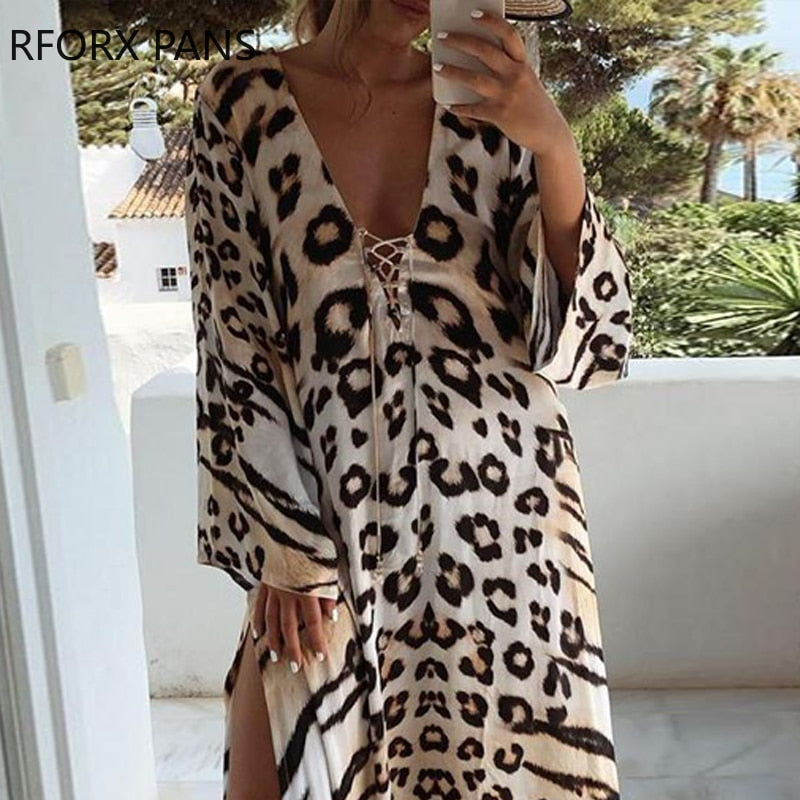 Dress Cheetah Print Lace-up Maxi Dress features a high slit, empire waistline, and V-neck neckline.