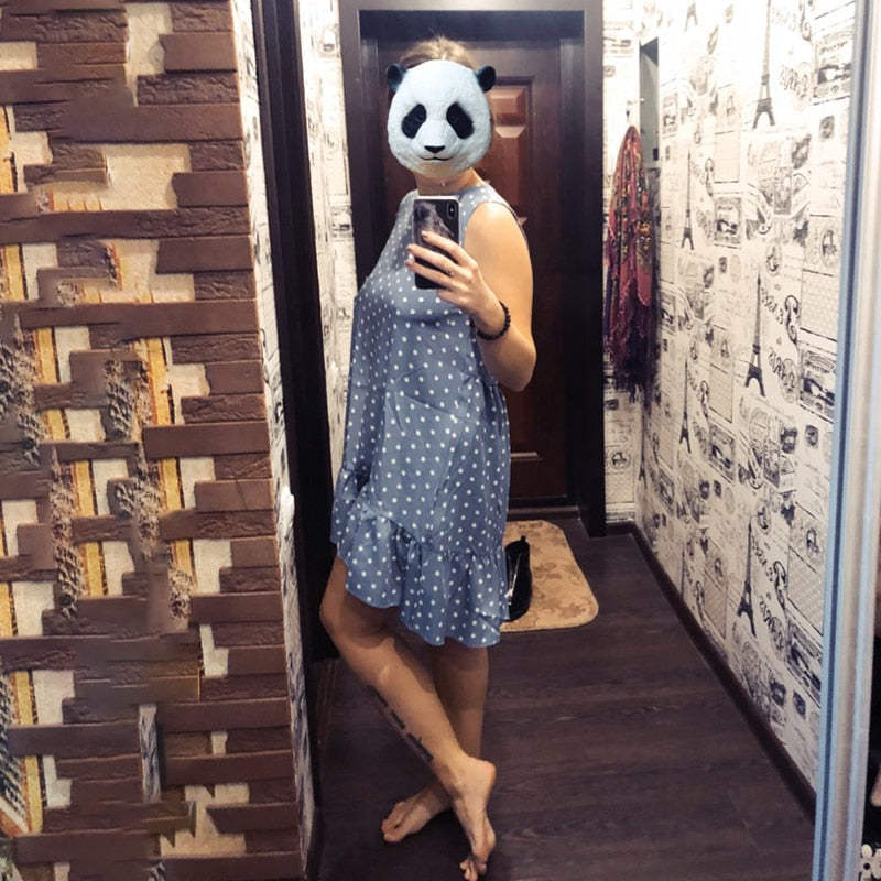 Dress features a fashion Polka Dot print, Sleeveless cut, Casual style, and a Loose fit.