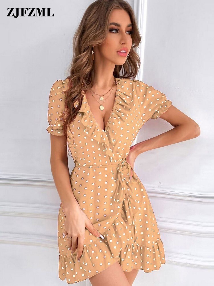 Short dress has a retro polka dot print, petite girls V-collar, short sleeves, luxury waist-shaping. Its waistline is empire, style is vintage, and the sleeve length is full.