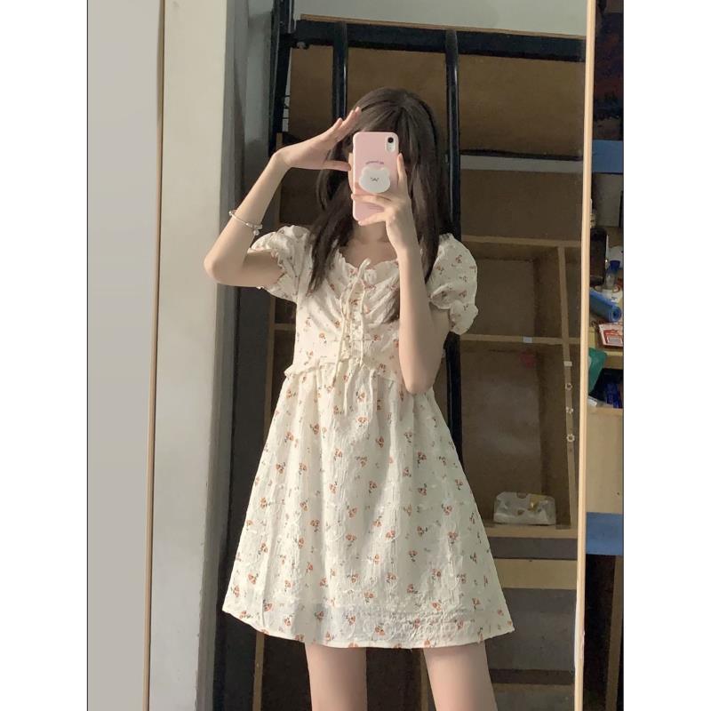 Petite girl dress is crafted from gentle milk sweet floral fabric.