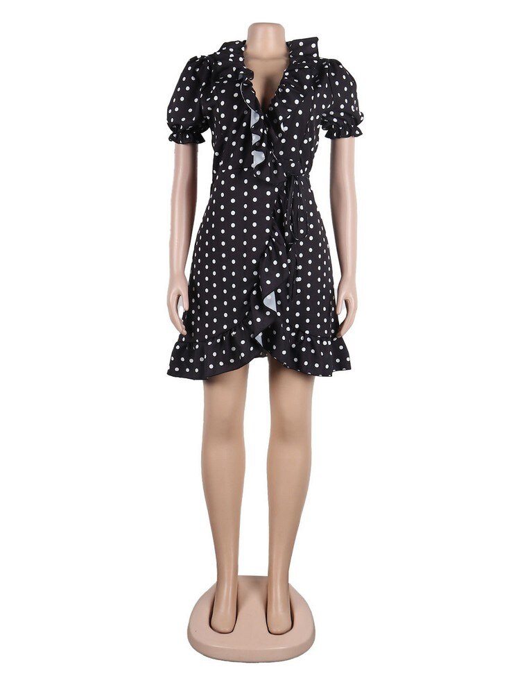 Short dress has a retro polka dot print, petite girls V-collar, short sleeves, luxury waist-shaping. Its waistline is empire, style is vintage, and the sleeve length is full.