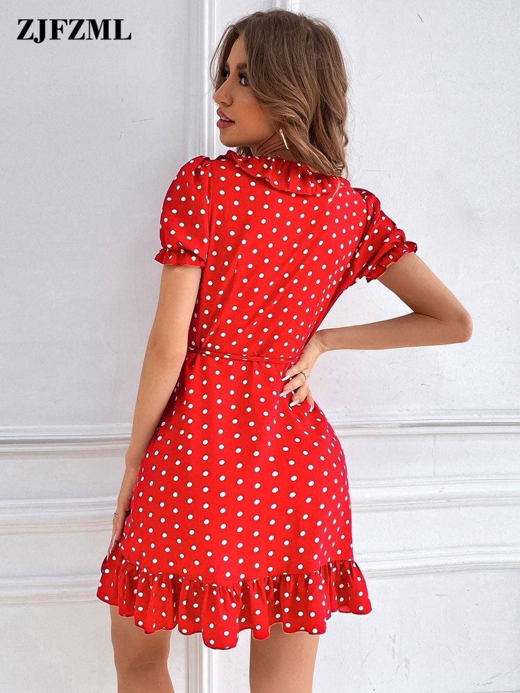 Short dress has a retro polka dot print, petite girls V-collar, short sleeves, luxury waist-shaping. Its waistline is empire, style is vintage, and the sleeve length is full.