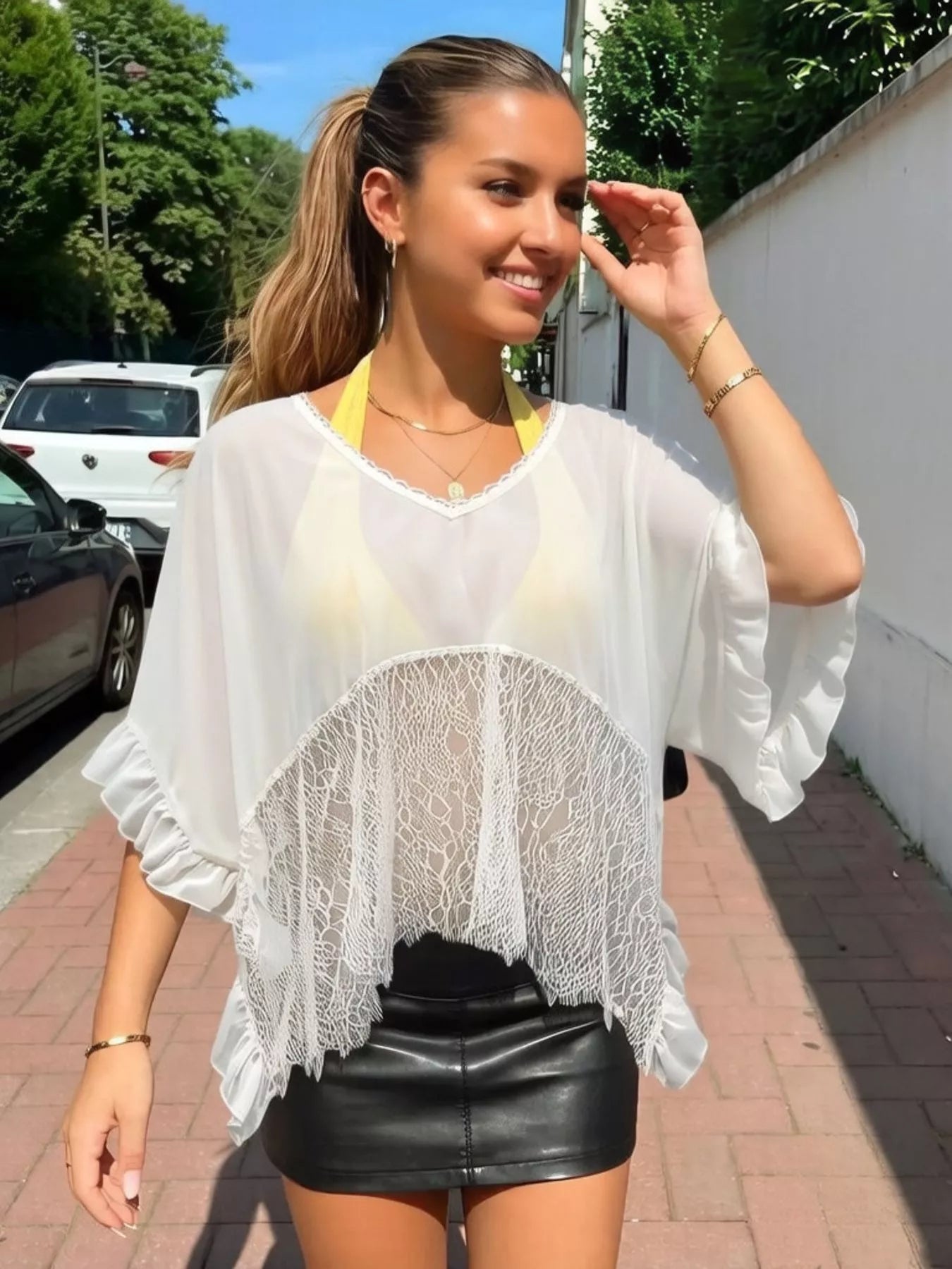 Santorini-inspired swim cover-up styled for resort wear