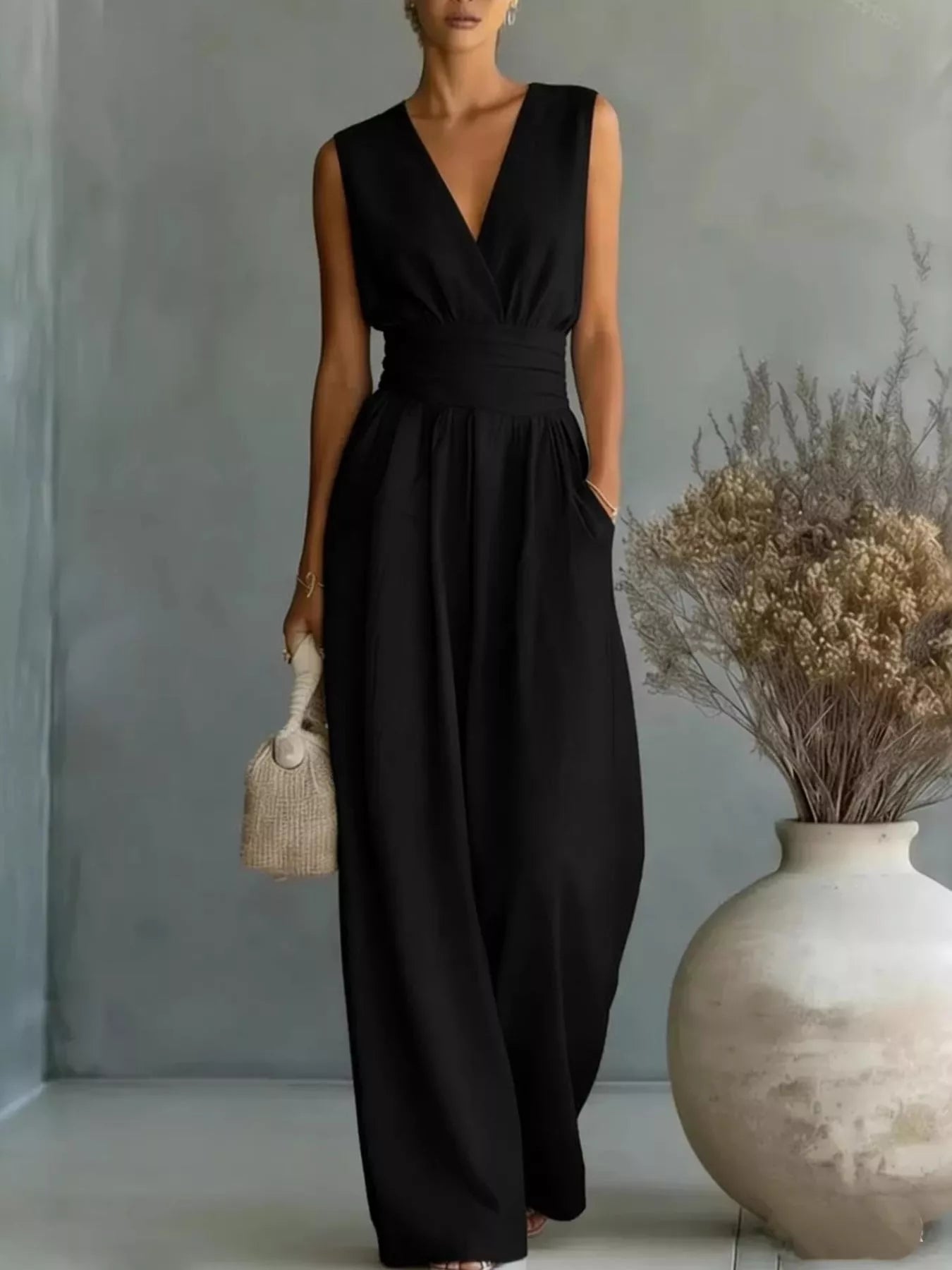 Classic black sleeveless wide-leg jumpsuit with pockets