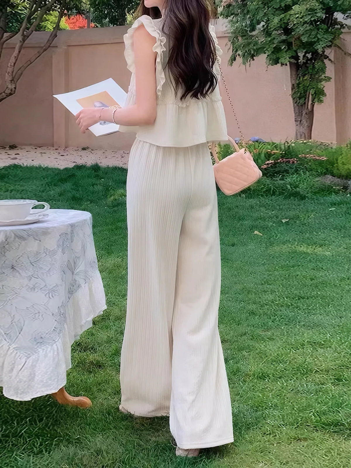 Side view of Riviera ruffled top and wide-leg pants set